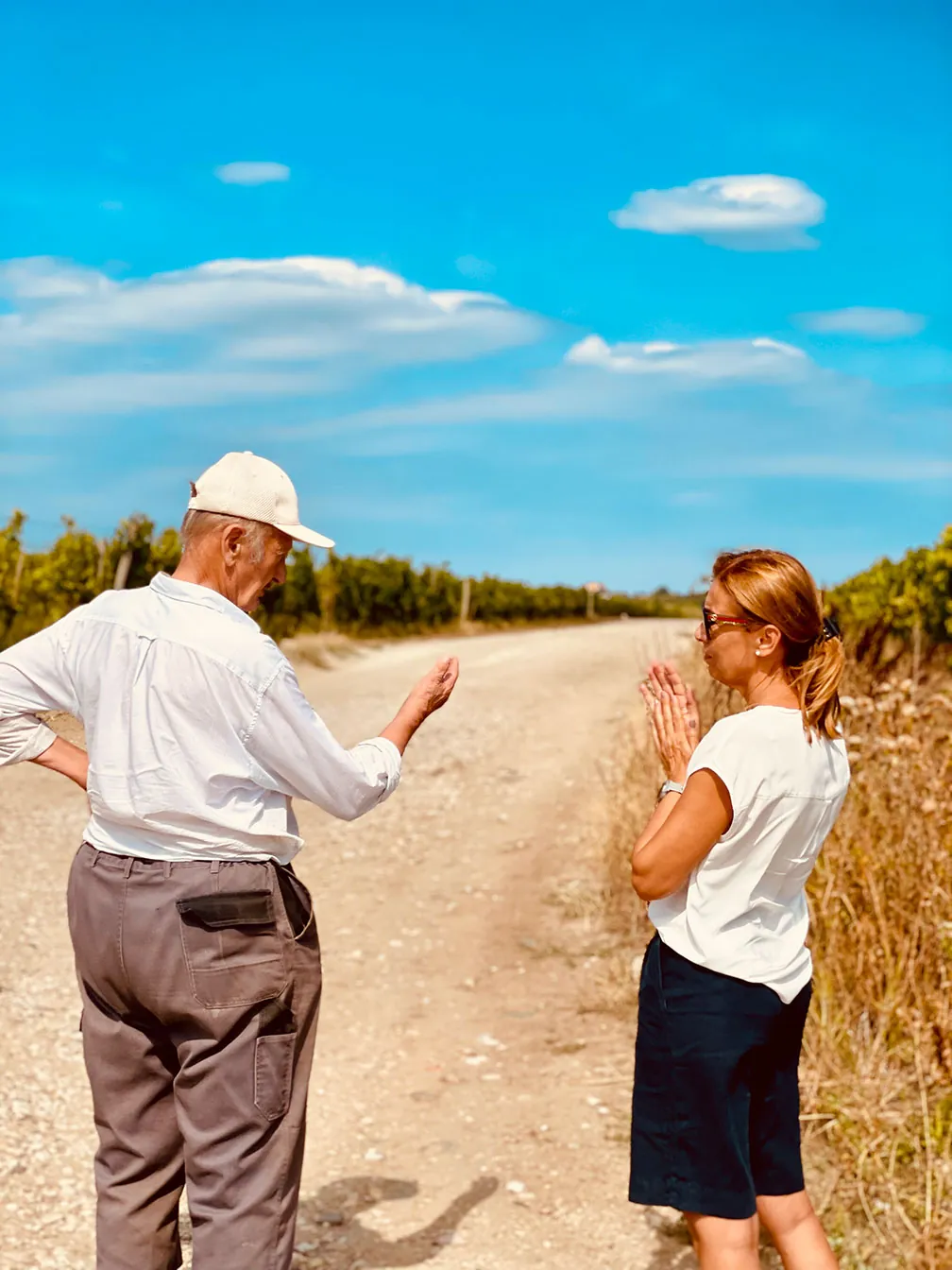 Uncle Feri and his daughter, Kata in the vineyard